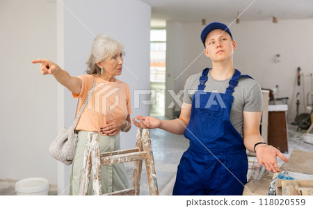 Disappointed young boy failed his part-time job in building site Disappointed young boy failed his part-time job in building site 118020559