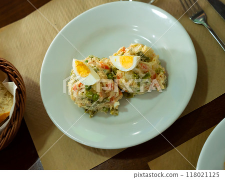 Spanish salad called Ensalada rusa Spanish salad called Ensalada rusa 118021125