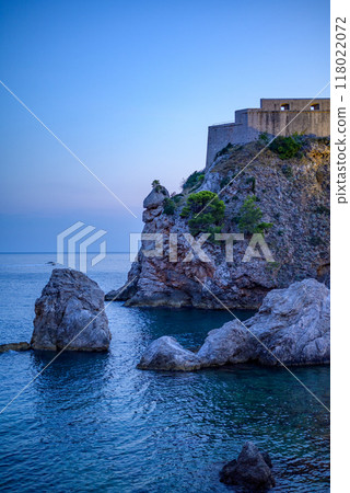 Medieval walls of the Old Walled City of Dubrovnik, UNESCO world heritage site at the Adriatic Sea in Croatia 118022072