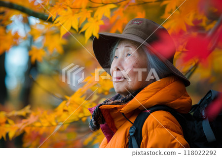 Senior woman trekking in Akiyama 118022292