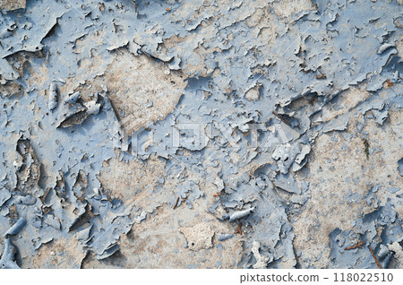 Peeling paint on the wall. a concrete wall with old cracked flaking paint 118022510