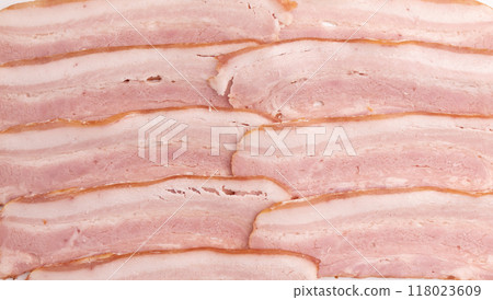 pieces of fresh bacon isolated on white background pieces of fresh bacon isolated on white background 118023609