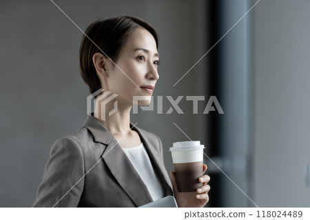 Business woman taking a break Business woman taking a break 118024489