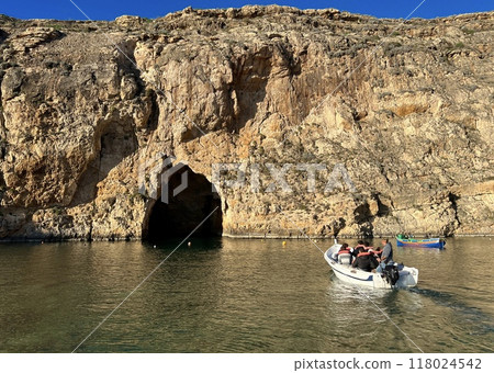 View of the cliffs on the island in Xlendi Bay on the island of Gozo Malta View of the cliffs on the island in Xlendi Bay on the island of Gozo Malta 118024542
