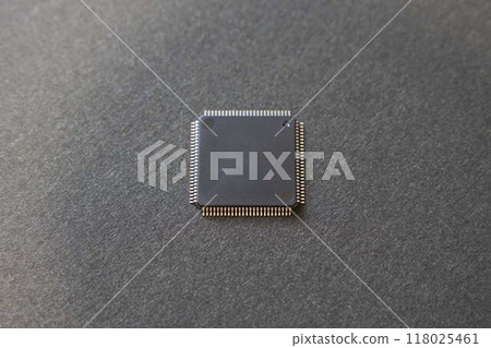Close-up of a semiconductor IC on a black background Close-up of a semiconductor IC on a black background 118025461