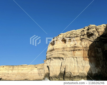 Rocky coast at Xlendi Bay of the island of Gozo, Malta, Europe 118026246