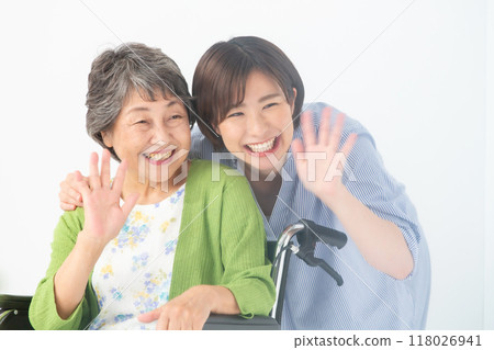 Grandma and grandson in wheelchair 118026941