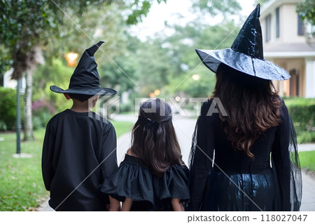 Rear view of a family dressed up in costume for Halloween. Generative AI. 118027047