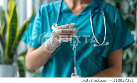 Healthcare Professional Preparing Vaccine Injection 118027351