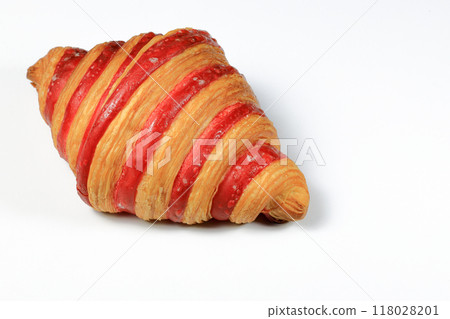 Freshly baked croissant, Double Rasberry croissant isolated on white background. French pastry closeup photo. Buttered bread croissant. 118028201