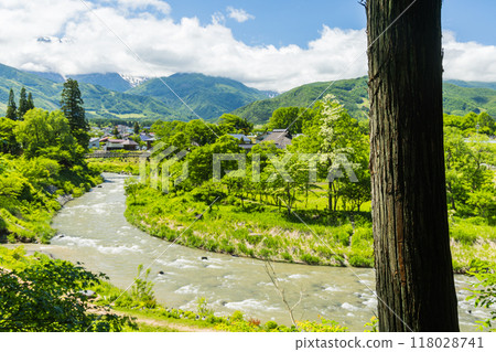 Oide Suspension Bridge, Himekawa River and Hakuba Sanzan as seen from the observation deck at Oide Park in Hakuba Village, Kitaazumi District, Nagano Prefecture, Japan Oide Suspension Bridge, Himekawa River and Hakuba Sanzan as seen from the observation deck at Oide Park in Hakuba Village, Kitaazumi District, Nagano Prefecture, Japan 118028741