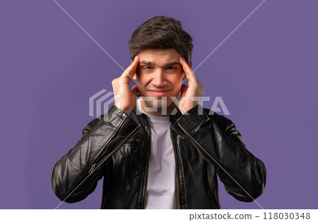 Mature man having hypertension headache, violet studio.Guy putting hands on head Mature man having hypertension headache, violet studio.Guy putting hands on head 118030348