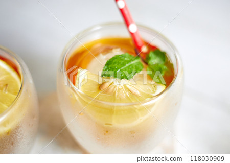 Homemade iced peach tea with lemon Homemade iced peach tea with lemon 118030909