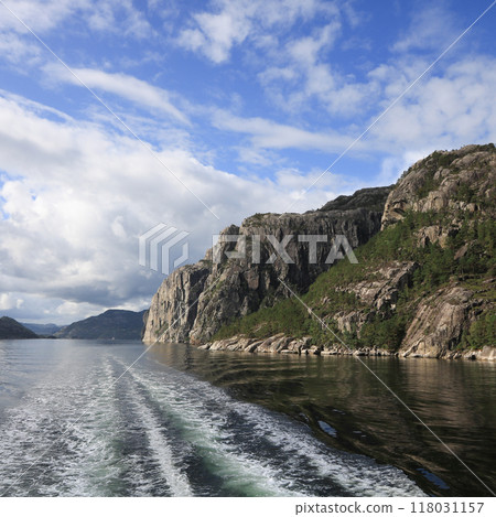 Steep cliffs at the shore of the Lysefjord, Norway. 118031157