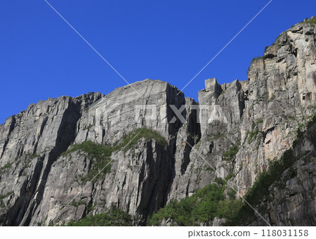 Famous Pulpit Rock Preikestolen seen from Lysefjord, Norway. Famous Pulpit Rock Preikestolen seen from Lysefjord, Norway. 118031158
