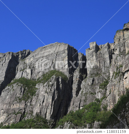 Scenic Pulpit Rock Preikestolen seen from below, Norway. Scenic Pulpit Rock Preikestolen seen from below, Norway. 118031159