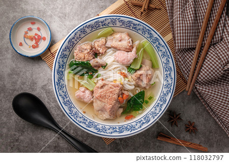 Luosifen is a speciality Chinese noodle in a white cup Contains Rice vermicelli, With clear soup seasoned with vinegar for a delicious taste. Luosifen is a speciality Chinese noodle in a white cup Contains Rice vermicelli, With clear soup seasoned with vinegar for a delicious taste. 118032797