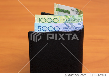 Old Turkmenistani manat in the black wallet Old Turkmenistani manat in the black wallet 118032901