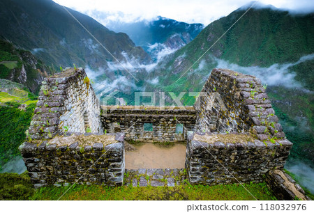 Sunshine view of Machupicchu stone anchient walls and temple among mountains 118032976