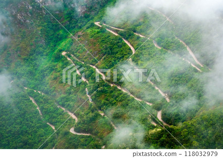 Aerial view of mountain forested serpetine road in Machupicchu 118032979