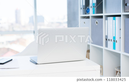 Modern laptop on white table Modern laptop on white table 118033425