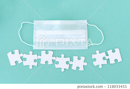 Medical mask and puzzle pieces 118033431