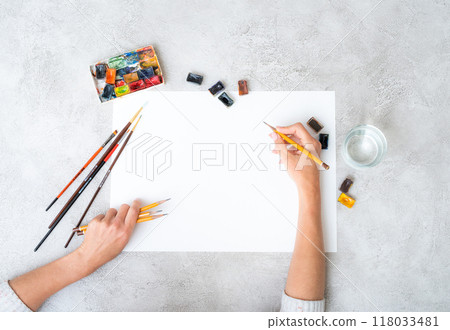 Top view of girl's hands drawing Top view of girl's hands drawing 118033481