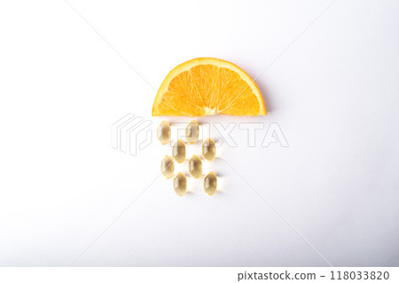 Vitamin C pills. Supplement capsules and orange. Soft vitamins capsule. Treatment and prevention of flu and colds, virus deseases. Healthcare concept banner. High quality photo Vitamin C pills. Supplement capsules and orange. Soft vitamins capsule. Treatment and prevention of flu and colds, virus deseases. Healthcare concept banner. High quality photo 118033820