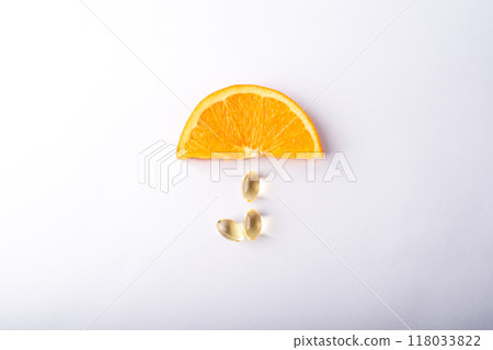 Vitamin C. Supplement capsules and orange. Soft vitamins capsule. Treatment and prevention of flu and colds, virus deseases. Healthcare concept banner. High quality photo 118033822