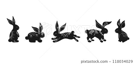 Set of rabbit silhouettes in different poses. Hand drawn rabbits decorated with white ornament with botanical elements. Vector illustration Set of rabbit silhouettes in different poses. Hand drawn rabbits decorated with white ornament with botanical elements. Vector illustration 118034029