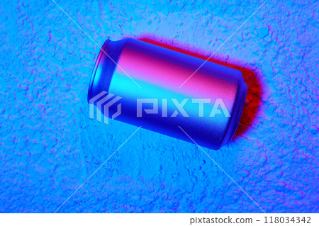 Aluminum can against textured surface in neon blue light, creating visually striking image for beer, soda water, lemonade, energy drinks advertisement. Aluminum can against textured surface in neon blue light, creating visually striking image for beer, soda water, lemonade, energy drinks advertisement. 118034342