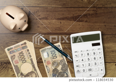 Image of new 100,000 yen banknote and savings Image of new 100,000 yen banknote and savings 118034530
