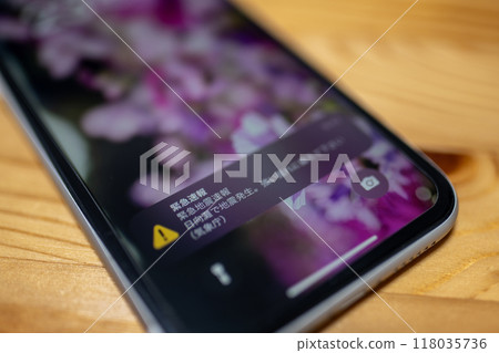 Emergency alert received on smartphone Emergency earthquake alert notification Emergency alert received on smartphone Emergency earthquake alert notification 118035736