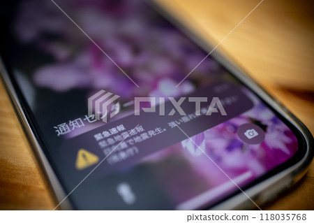 Emergency alert received on smartphone Emergency earthquake alert Notification Ambient dimming 118035768