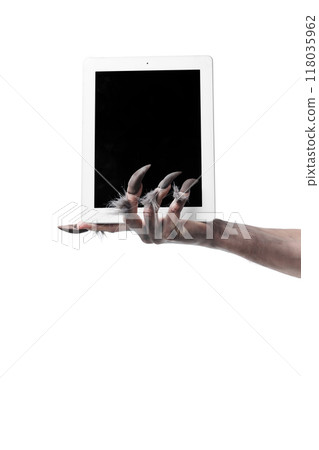 Werewolf's hand with long fingers and nails, paw holding modern tablet with blank screen against white studio background. Werewolf's hand with long fingers and nails, paw holding modern tablet with blank screen against white studio background. 118035962