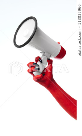 Horror red devil's hand with blank long nails holding megaphone against white studio background. Negative space to insert text. Ad Horror red devil's hand with blank long nails holding megaphone against white studio background. Negative space to insert text. Ad 118035966
