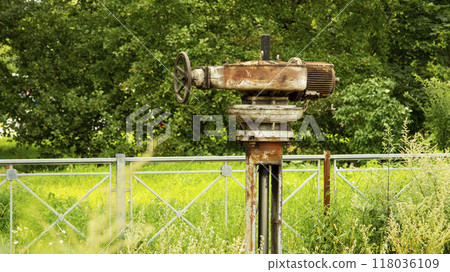 The valve of the Northern Streams gas pipeline is overgrown with grass The valve of the Northern Streams gas pipeline is overgrown with grass 118036109