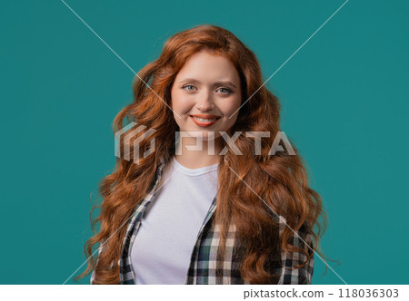 Charming Real Woman, Ginger Hair, Natural Beauty. Young Girl On Blue, Kind smile Charming Real Woman, Ginger Hair, Natural Beauty. Young Girl On Blue, Kind smile 118036303