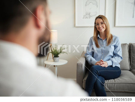 Woman receiving therapy in a calm environment Woman receiving therapy in a calm environment 118036589