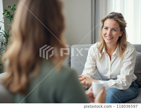Smiling Woman in a Therapy Session 118036597