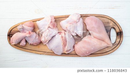 Raw mixed chicken meat parts  for cooking on rustic background 118036843