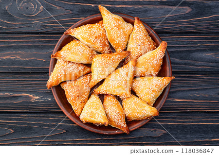 Homemade triangle puff pastry with meat on rustic background . Samosa 118036847