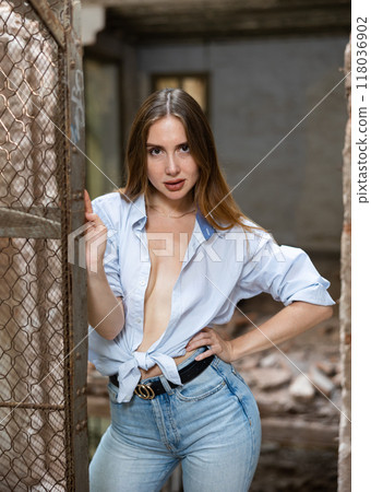 Portrait of attractive woman in abandoned building 118036902