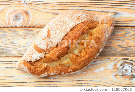 Loaf of wheat hearth bread . Top view Loaf of wheat hearth bread . Top view 118037066
