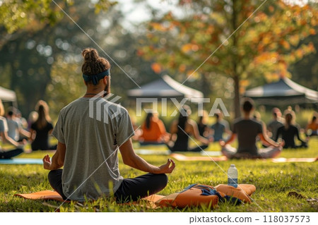 Group of Diverse People Practicing Yoga Together in a Beautiful Natural Park Setting 118037573