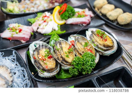 Korean seafood dishes. Grilled abalone shell Korean seafood dishes. Grilled abalone shell 118038786