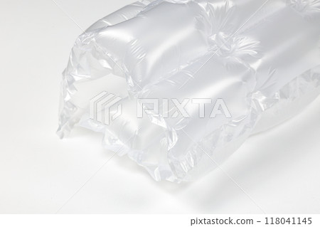 Close up plastic translucent air packaging, Plastic translucent packaging with air cushion. Inflatable air bag isolated on white background. Close up plastic translucent air packaging, Plastic translucent packaging with air cushion. Inflatable air bag isolated on white background. 118041145