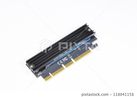 Storage controller adapter M2 NVME to PCIe X16 card with NVMe storage under heat sink isolated on white background. 118041158