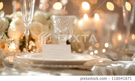 A sophisticated dinner setup featuring ornate tableware surrounded by flickering candles 118041871