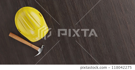 Overhead of Yellow Hard Hat and Hammer on a Wood Surface with Room For Text. 118042275